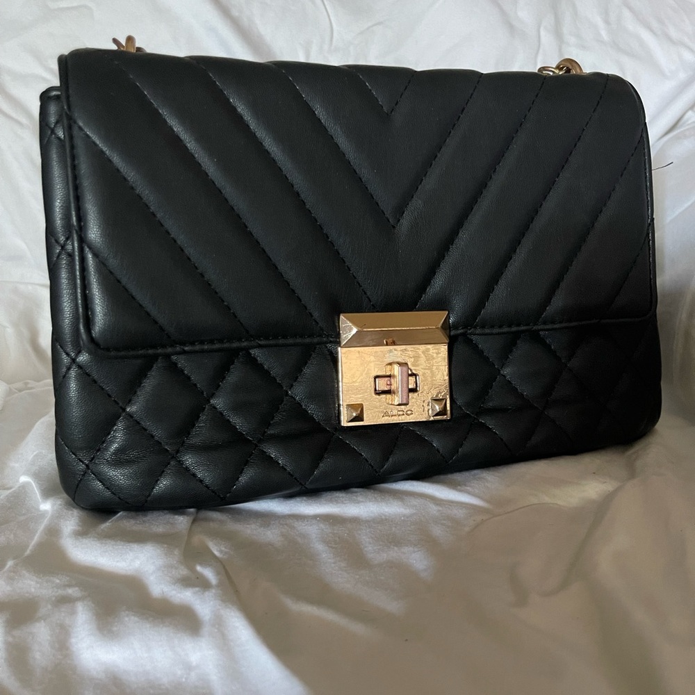 Black with gold toned chain strap handbag